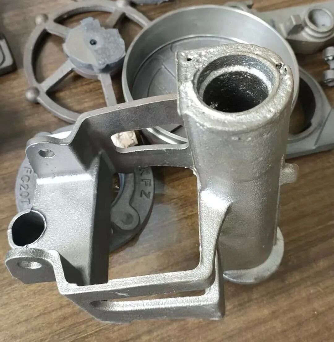 Obróbka w przypadku dużej porowatości cylindrycznych rdzeni piaskowych podczas produkcji części z żeliwa sferoidalnego przy użyciu technologii formowania piaskiem na surowo